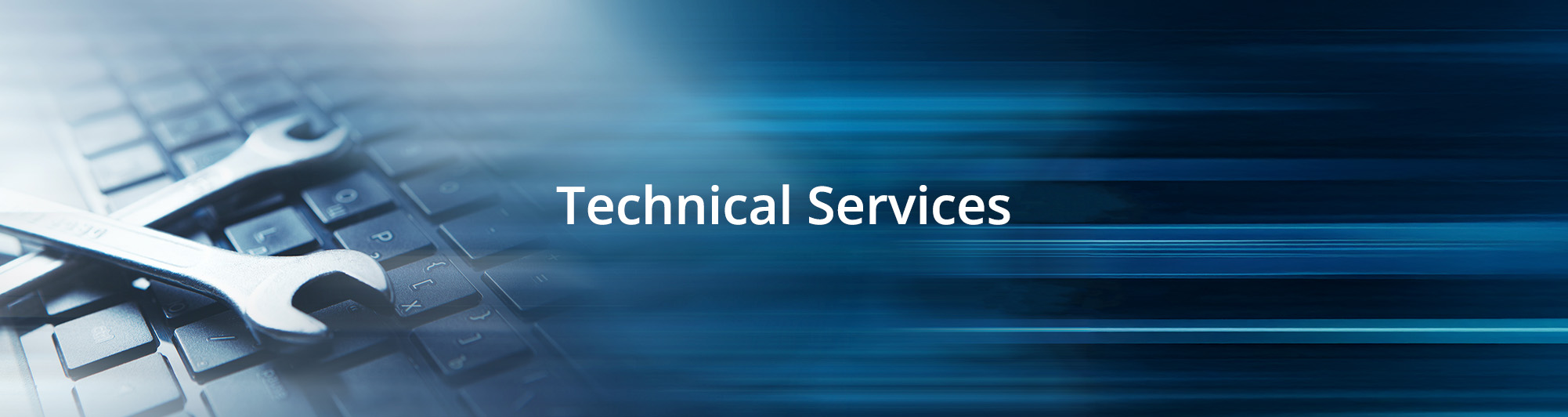 wrenches laying crossed over a laptop keyboard with the text 'Technical Services' on top